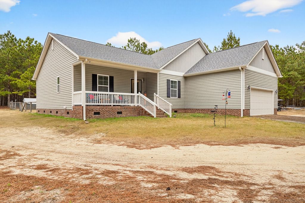 Photo of 6797 M W Rickenbaker Road, Summerton, SC 29148 (MLS # 25033209)