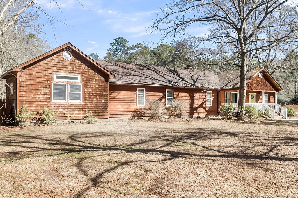 Photo of 6911 Buckhorn Road, Ravenel, SC 29470 (MLS # 26004739)