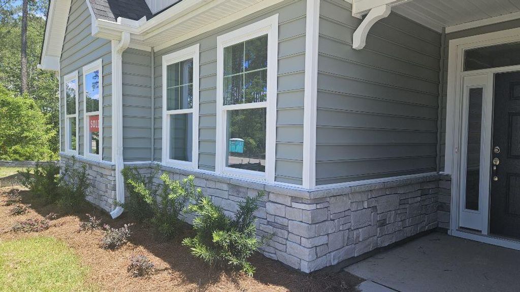 Photo of 263 Huguenot Trail, Huger, SC 29450 (MLS # 26007392)