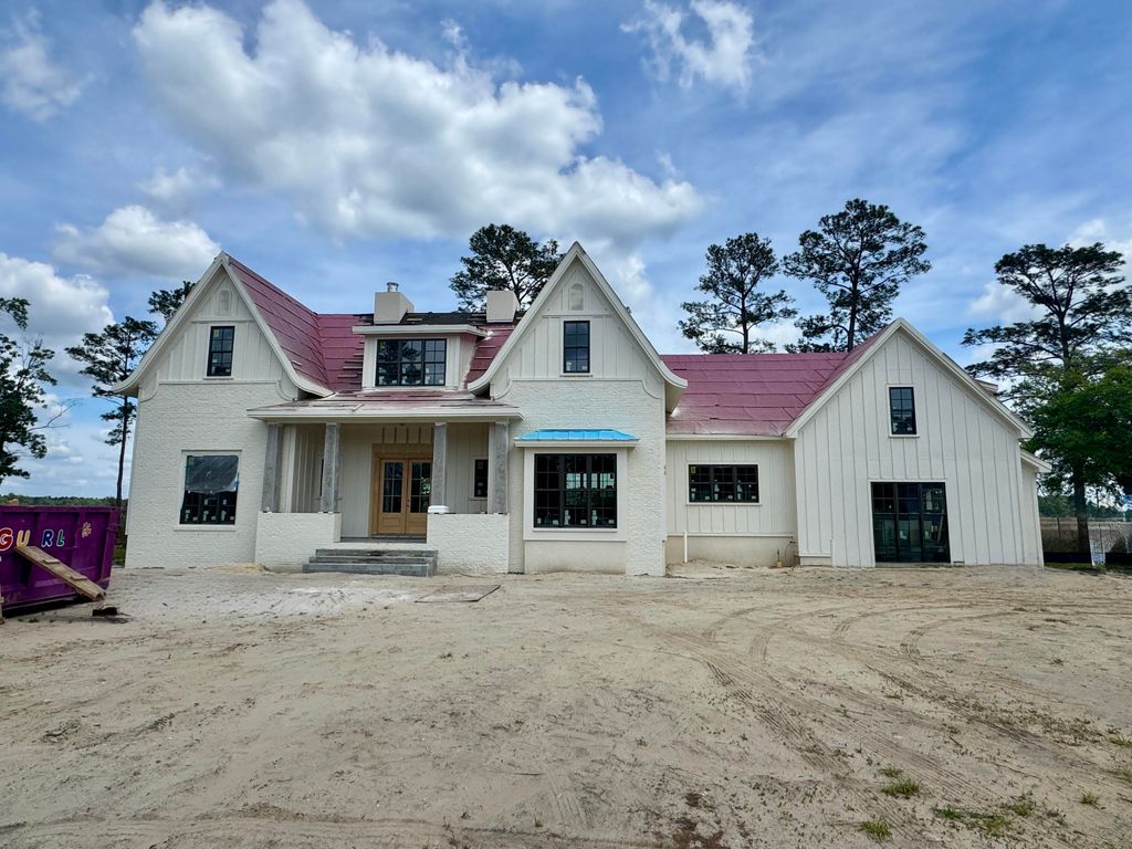 Photo of 113 Silverbell Lane, Ravenel, SC 29470 (MLS # 26002249)