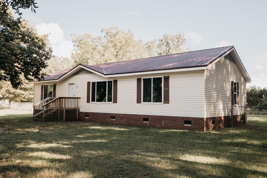 Photo of 5823 Drayton Street, Ravenel, SC 29470 (MLS # 26025607)