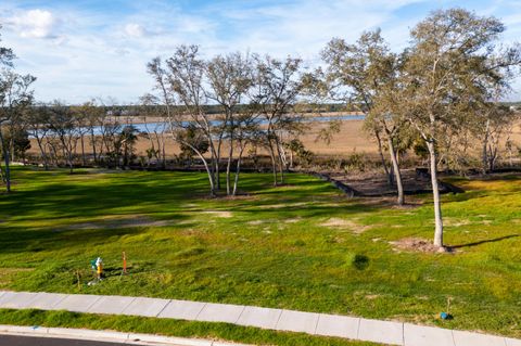 Photo of 929 Fish Camp Road, Charleston, SC 29492 (MLS # 23017402)