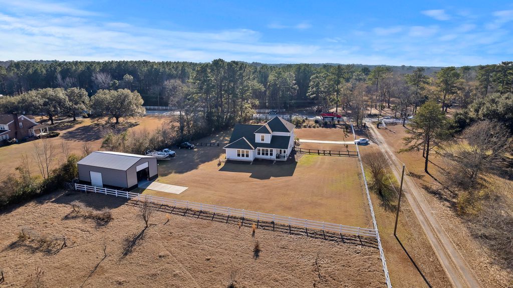 Photo of 6128 Highway 165, Ravenel, SC 29470 (MLS # 26002673)