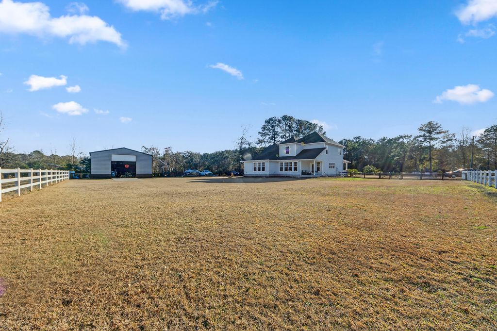 Photo of 6128 Highway 165, Ravenel, SC 29470 (MLS # 26002673)