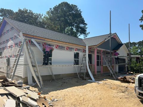 Photo of 1833 Woodland Road, Charleston, SC 29414 (MLS # 26012154)