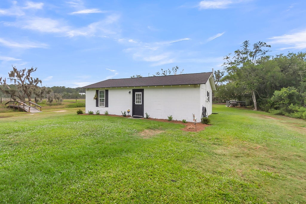 Photo of 6504 Rozier Road, Meggett, SC 29449 (MLS # 26017410)