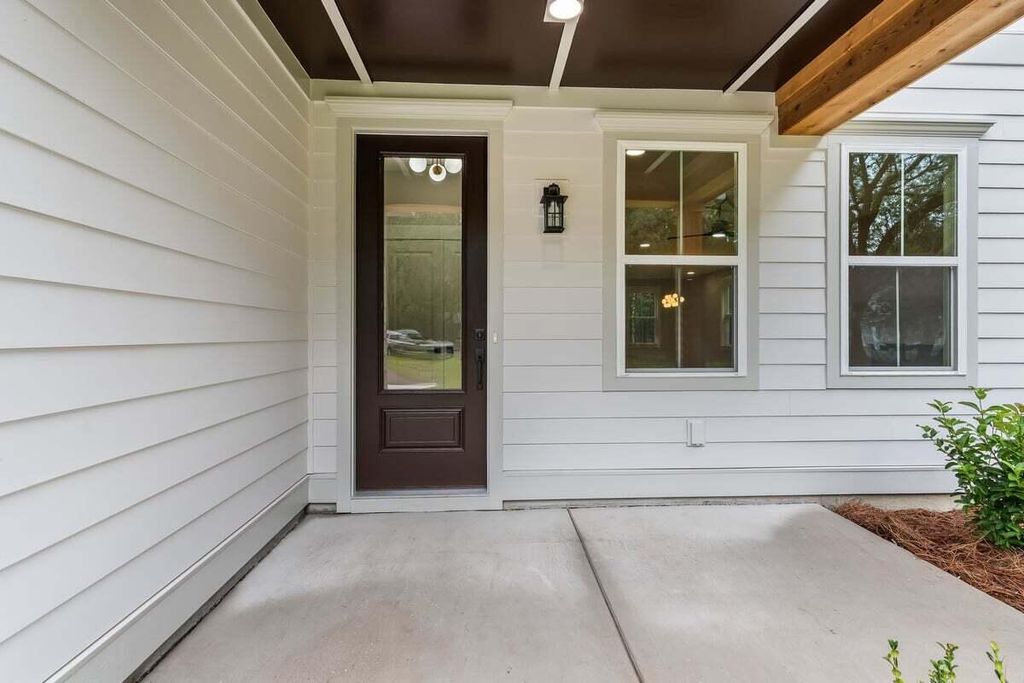 Photo of 6407 Farm House Road, Ravenel, SC 29470 (MLS # 25027880)