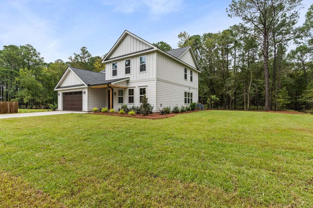 Photo of 6407 Farm House Road, Ravenel, SC 29470 (MLS # 25027880)