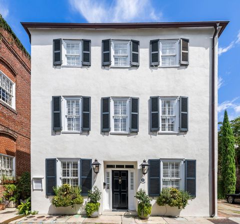 Photo of 8 & 8 1/2 Elliott Street, Charleston, SC 29401 (MLS # 25022852)
