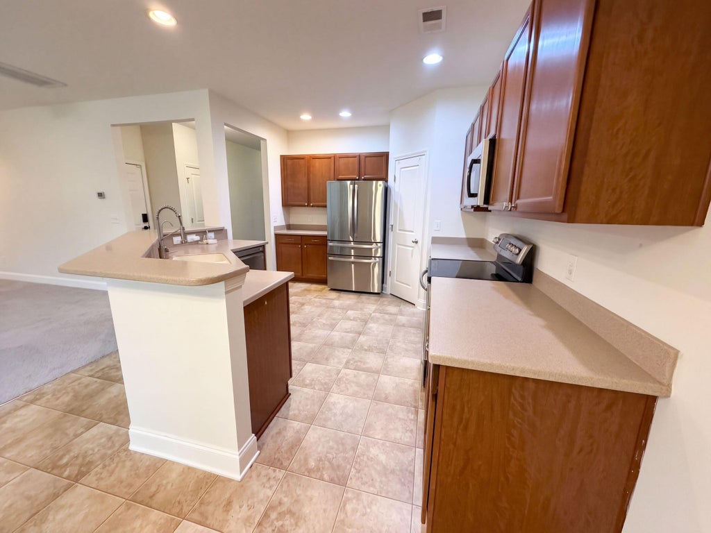 Photo of 301 Freeland Way, Moncks Corner, SC 29461 (MLS # 26027678)