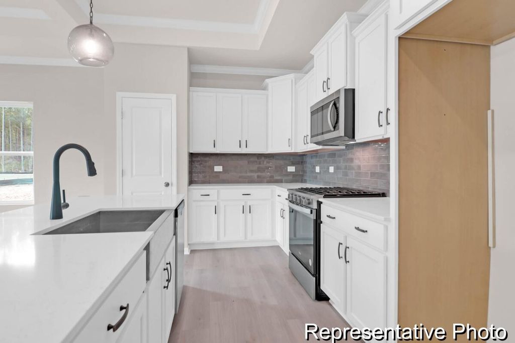 Photo of 1017 Mourning Warbler Way #Cc3-17-8, Ravenel, SC 29470 (MLS # 26006879)