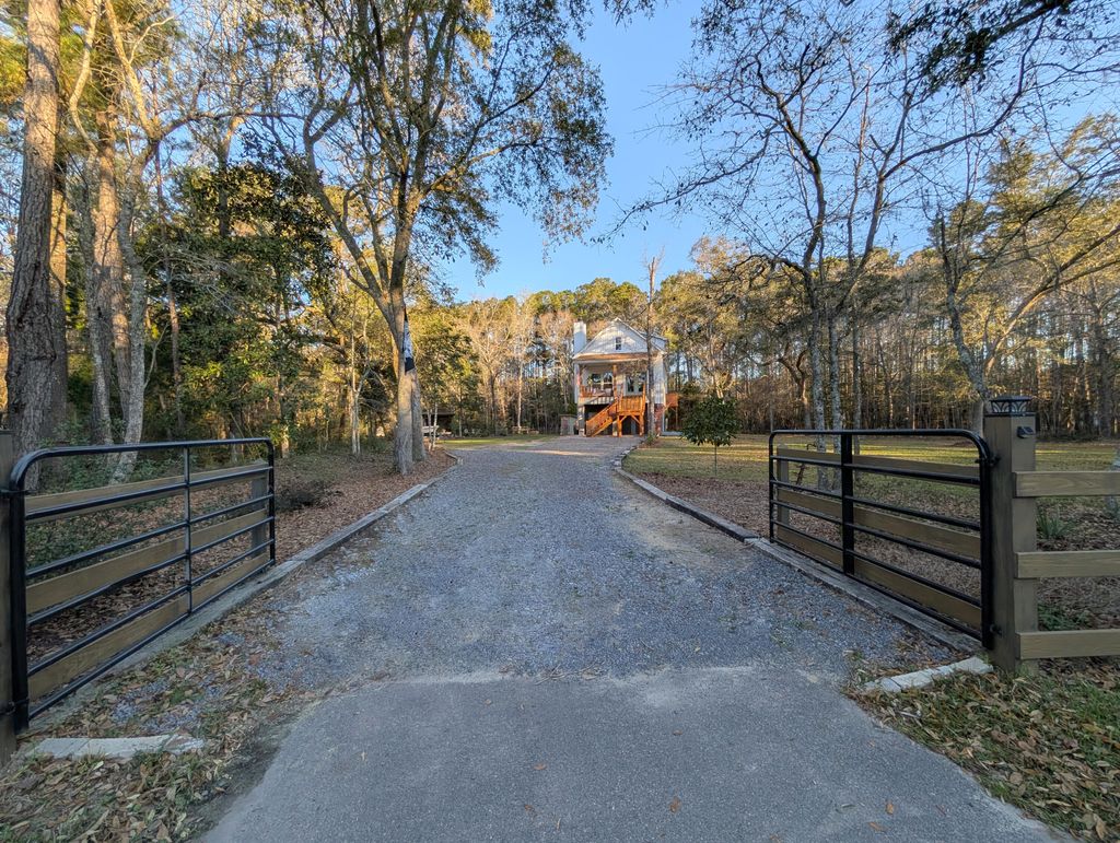 Photo of 695 Kit Hall Road, McClellanville, SC 29458 (MLS # 26007782)