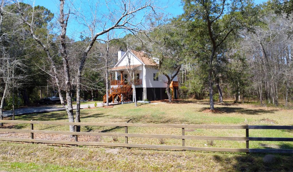 Photo of 695 Kit Hall Road, McClellanville, SC 29458 (MLS # 26007782)