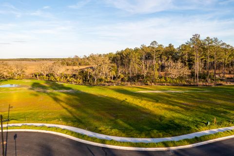 Photo of 909 Fish Camp Road, Charleston, SC 29492 (MLS # 23010250)