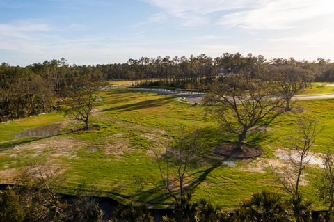 Photo of 917 Fish Camp Road, Charleston, SC 29492 (MLS # 23018601)