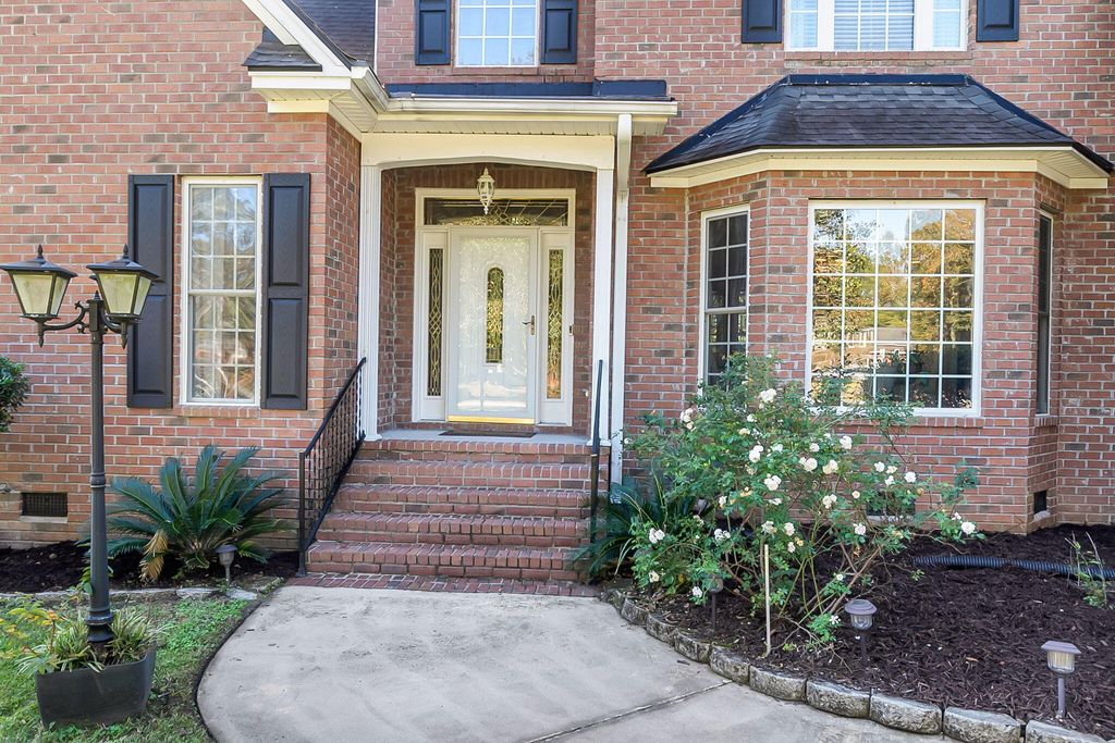 Photo of 8675 Laurel Grove Lane, North Charleston, SC 29420 (MLS # 25030066)