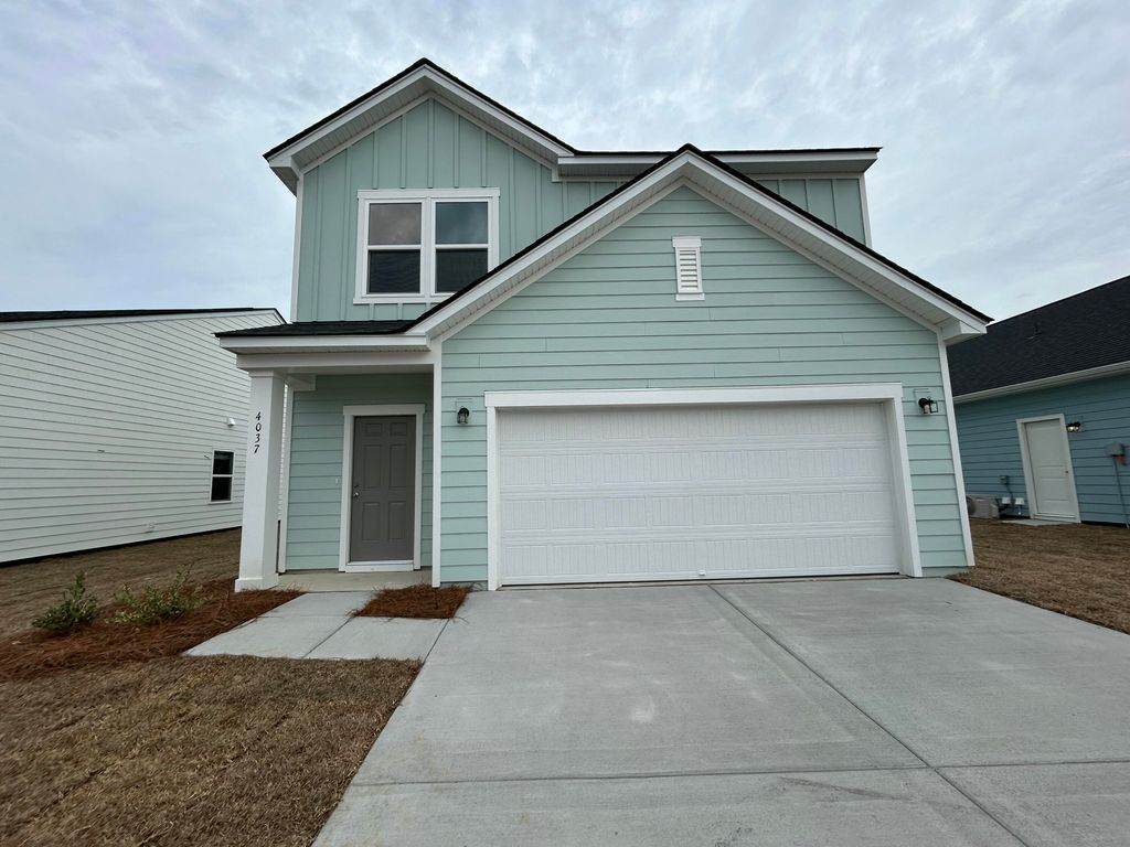 Photo of 4037 Lemon Grass Lane, Ravenel, SC 29470 (MLS # 25029657)