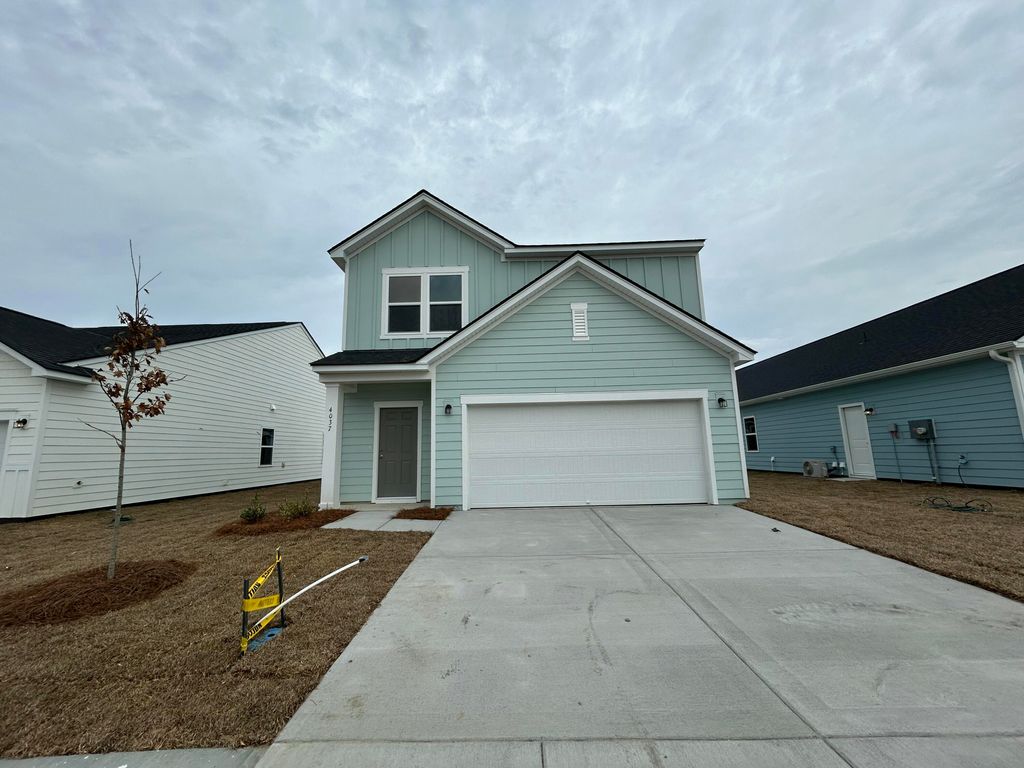 Photo of 4037 Lemon Grass Lane, Ravenel, SC 29470 (MLS # 25029657)