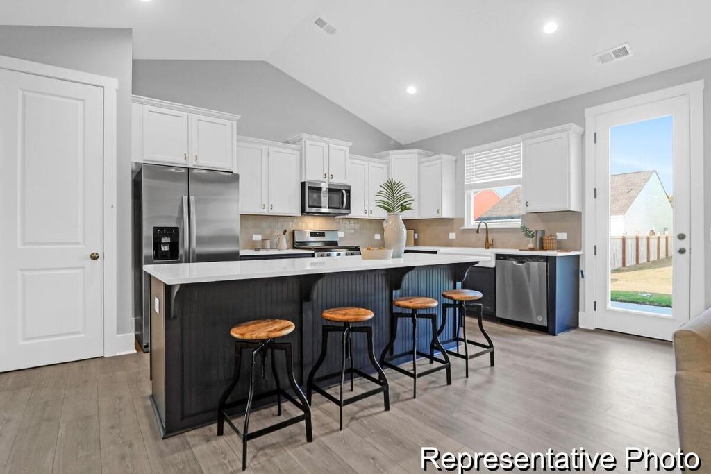 Photo of 1013 Mourning Warbler Way #Cc3-17-6, Ravenel, SC 29470 (MLS # 26010424)