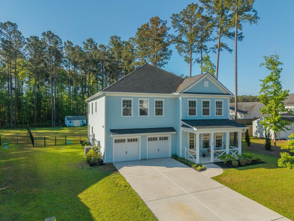 Photo of 303 Theus Place, Huger, SC 29450 (MLS # 26011233)