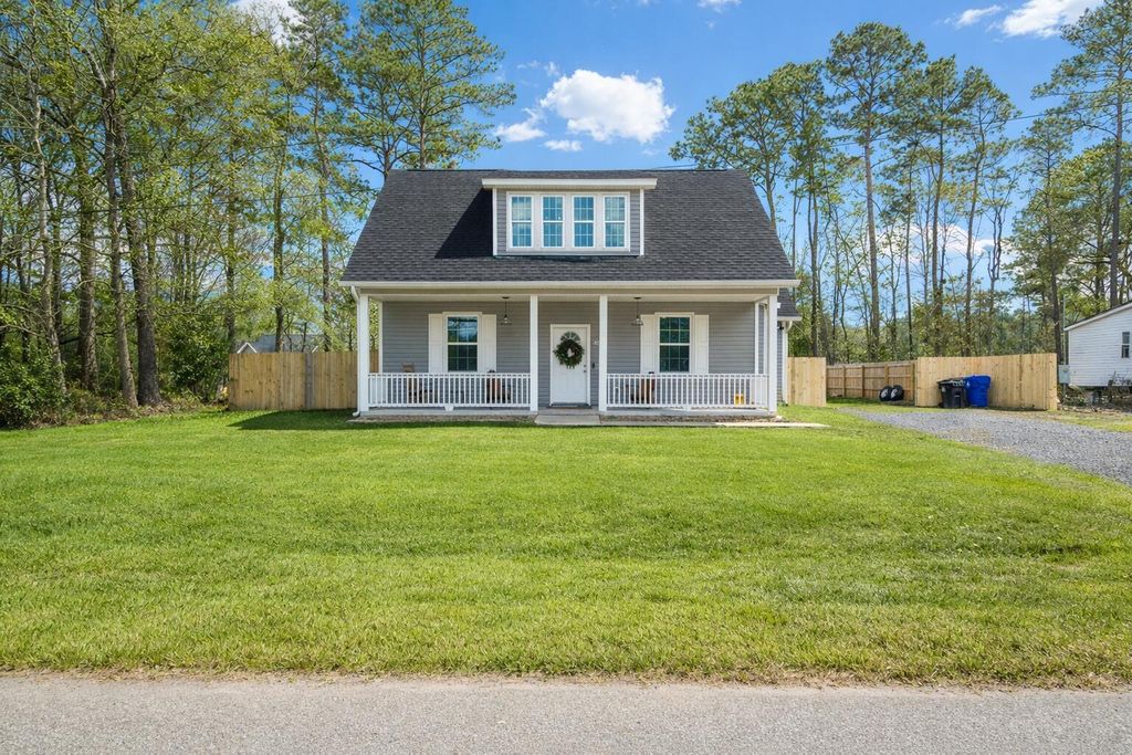 Photo of 6109 Smith Road, Ravenel, SC 29470 (MLS # 26000988)