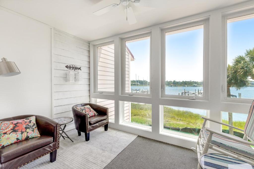 Photo of 74 Mariners Cay Dr, Folly Beach, SC 29439 (MLS # 26029246)