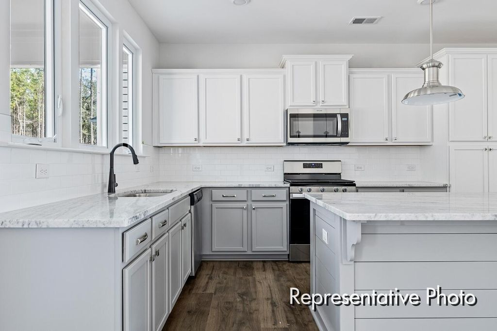 Photo of 1023 Marsh Harrier Drive #Cc3-3-5, Ravenel, SC 29470 (MLS # 25031859)