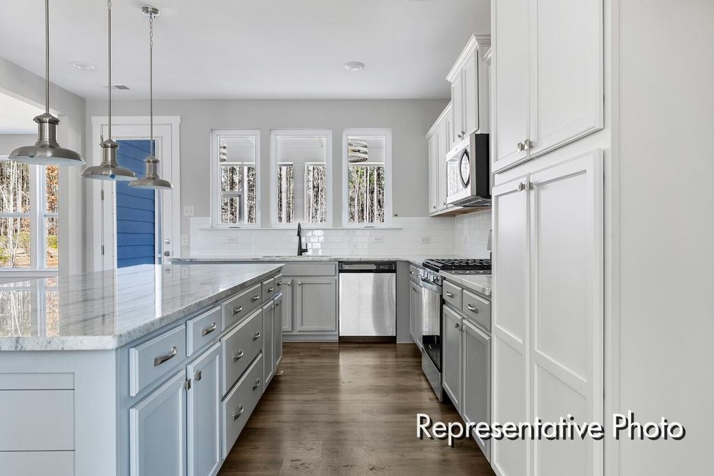 Photo of 1023 Marsh Harrier Drive #Cc3-3-5, Ravenel, SC 29470 (MLS # 25031859)