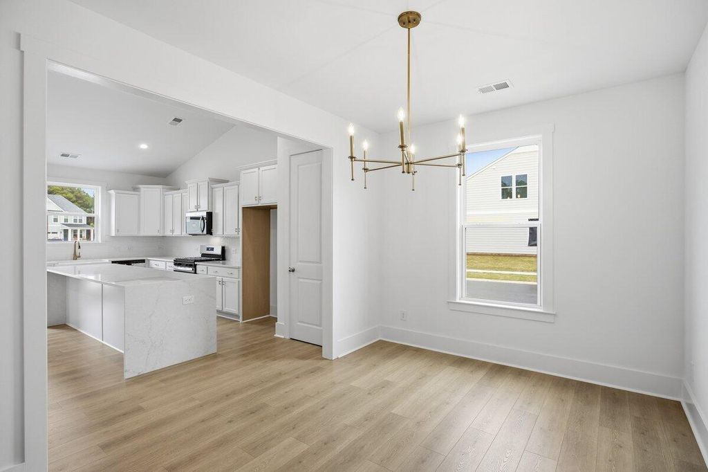 Photo of 1041 House Finch Avenue #Cc3-21-12, Ravenel, SC 29470 (MLS # 26010430)