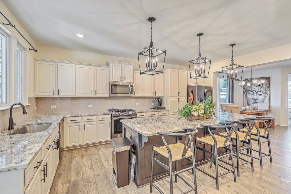 Photo of 1032 Magnolia Warbler Way, Ravenel, SC 29470 (MLS # 26004718)