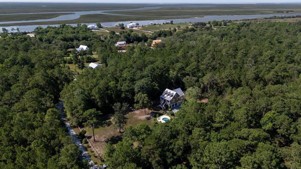 Photo of 414 Mouzons BLF, McClellanville, SC 29458 (MLS # 26018611)