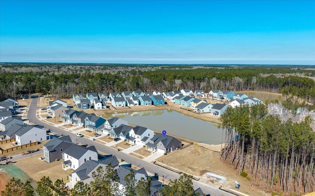 Photo of 1033 Marsh Harrier Dr, Ravenel, SC 29470 (MLS # 26002414)