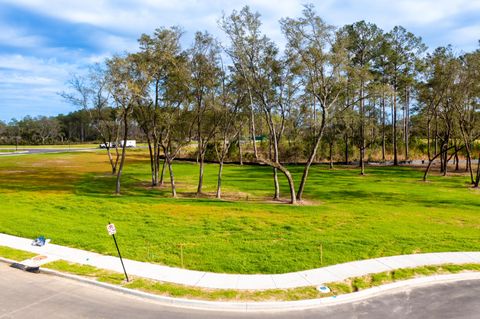 Photo of 938 Fish Camp Road, Charleston, SC 29492 (MLS # 23015192)