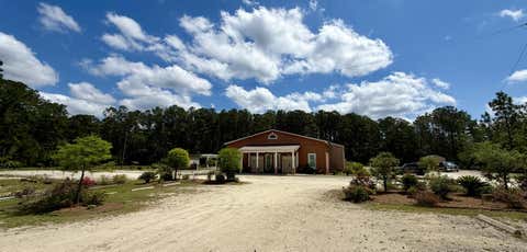 Photo of 1762 Cainhoy Road, Huger, SC 29450 (MLS # 26016812)