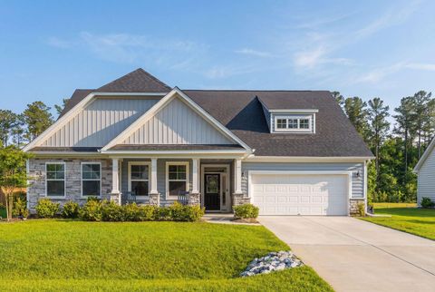 Photo of 169 Huguenot Trail, Huger, SC 29450 (MLS # 26011925)