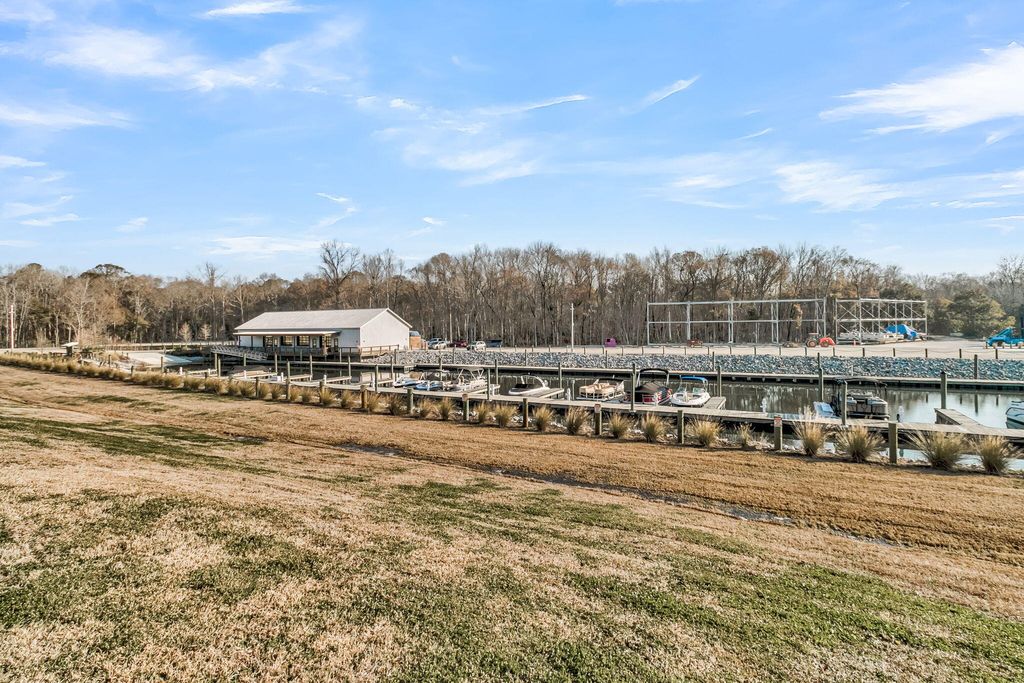 Photo of 1402 Tailrace Drive, Moncks Corner, SC 29461 (MLS # 26003305)