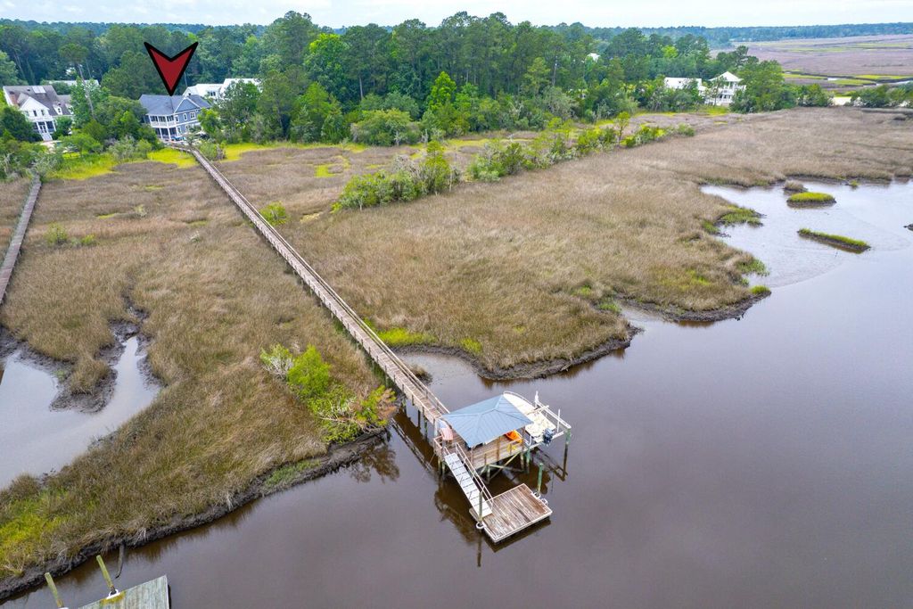 Photo of 4385 Ten Shillings Way, Ravenel, SC 29470 (MLS # 26007736)