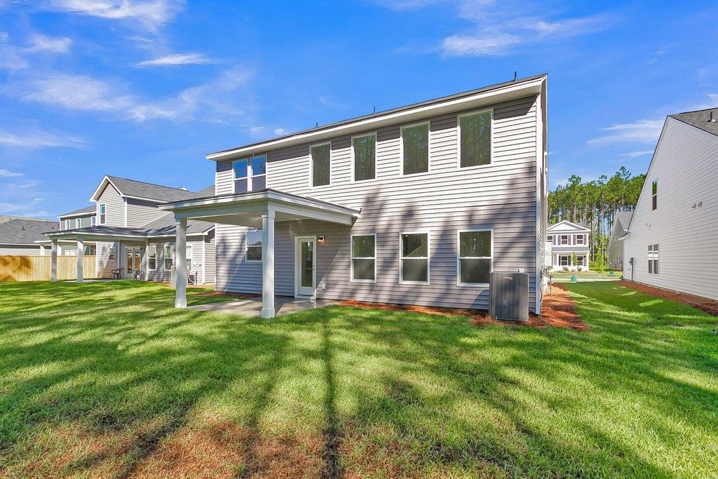 Photo of 1066 Tea Maker Road, Ravenel, SC 29470 (MLS # 25030166)