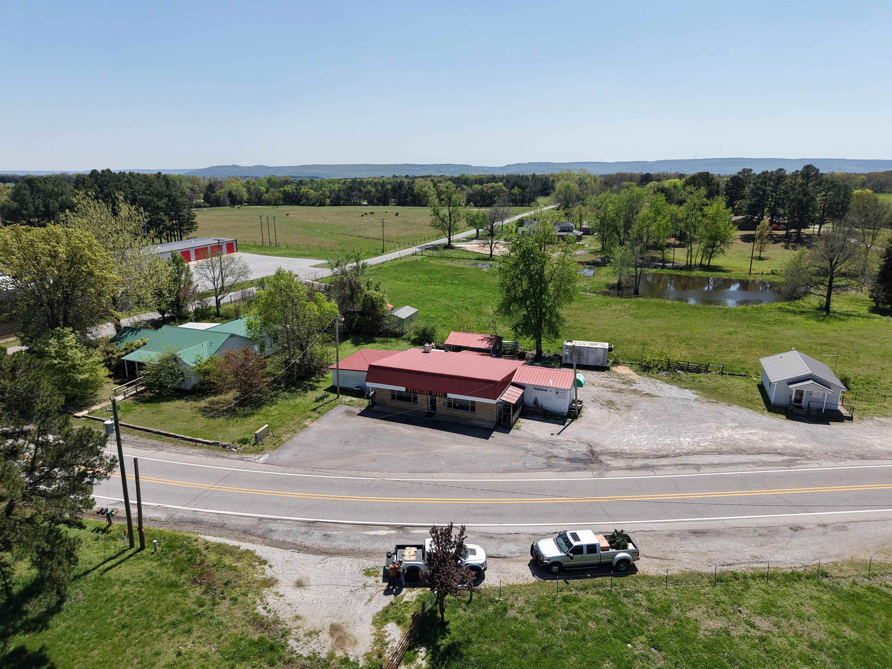 Discover a unique chance to own a versatile business property in Bethesda, Arkansas, located just minutes from Batesville and a short drive to the scenic White River. This property, formerly known as the Bethesda Store, offers endless possibilities with no restrictions, making it an ideal investment for entrepreneurs, developers, or anyone seeking commercial real estate in Independence County, AR. With its flexible layout, this property can easily be transformed into a restaurant, laundromat, retail shop, store, office space, or more. With historic roots as a longtime local gathering spot, this property has served both residents and travelers for decades, adding unique character and charm. Whether you’re looking for an Arkansas investment property or searching for commercial real estate near Batesville, AR, this listing checks all the boxes. Priced at just $239,900, with owner financing available, it’s a rare opportunity to create your own business or investment project.