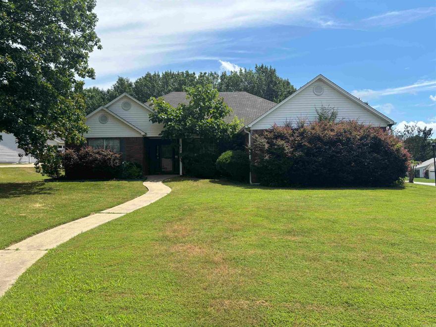 Discover the allure of this stunning corner lot, complete with a spacious master suite, expansive master bathroom, and a generously sized walk-in closet. Unwind in the luxurious jetted tub or the convenient walk-in shower with seating. The kitchen is equipped with a gas cook stove. Enjoy the tranquility of the surrounding subdivision, featuring a nearby dog park and a community pool. The location offers convenient access to outlets, restaurants, movies, shopping, and various amenities. AGENTS SEE REMARKS.