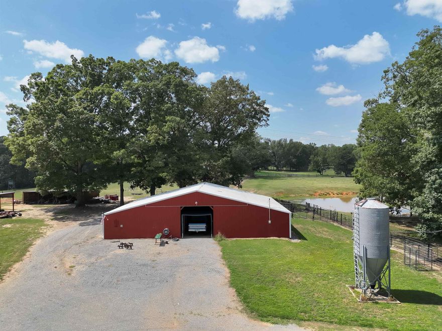This 60± acre turn-key cattle farm in Sheridan, AR, offers a rare mix of agricultural function, outdoor lifestyle, and hunting opportunity. Every detail of the property has been thoughtfully designed and well-maintained, making it a place you can step right into and start using from day one. At the heart of the farm is a 60x50 barn with working pens and chutes, supported by cross-fencing and multiple gated sections that make handling livestock efficient and safe. A 60x15 lean-to provides covered parking for trailers or equipment, while an additional 18x50 covered area offers even more protected storage. For those who value flexibility, a covered 60x40 arena with cattle gate enclosures expands the farm’s potential, whether for training, sorting, or hosting events. Water and electricity are at barn. What makes this property especially appealing is how well-kept it is - everything is clean, organized, and ready for the next owner.