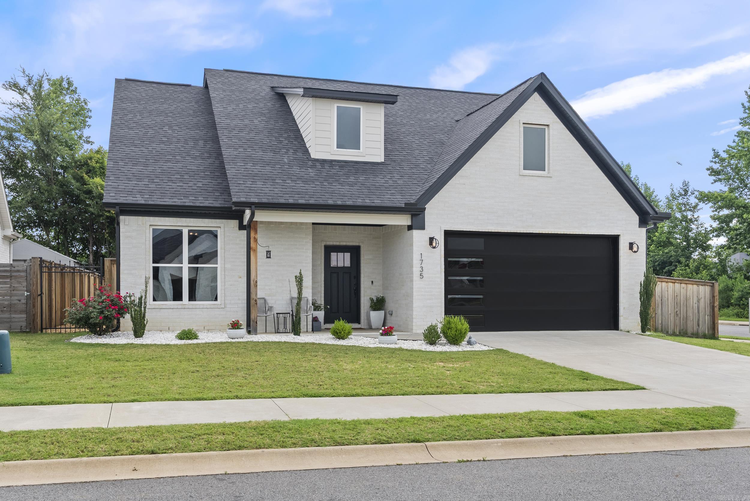 Stunning move-in ready home with 4 bedrooms and 3 full bathrooms for under $400k in Conway! Home is only 4 years old. Open floor plan with gorgeous electric fireplace in the living room. The living room is open to the kitchen and dining area. The kitchen features quartz countertops, a beautiful backsplash, and large pantry. The secluded primary suite has two sinks, an oversized custom shower with soaking tub, and walk-in closet. Gorgeous barn door in the entry to the bathroom. The other downstairs bedroom works great as an office or guest bedroom with a full bathroom just off of it. The other two bedrooms are located upstairs. Each bedroom has a walk-in closet. Full bathroom upstairs. A spacious second living area upstairs separates the two bedrooms. This is a great feature for guests or family who want their own living area to play games or watch t.v. Outside you'll find beautifully landscaping in the front and a covered patio in the back. Wood privacy fence in the backyard. Low maintenance yard gives you more time to spend with friends and family. Great location with easy access to several schools, shopping, and restaurants. This is a hidden gem. Schedule your showing today!