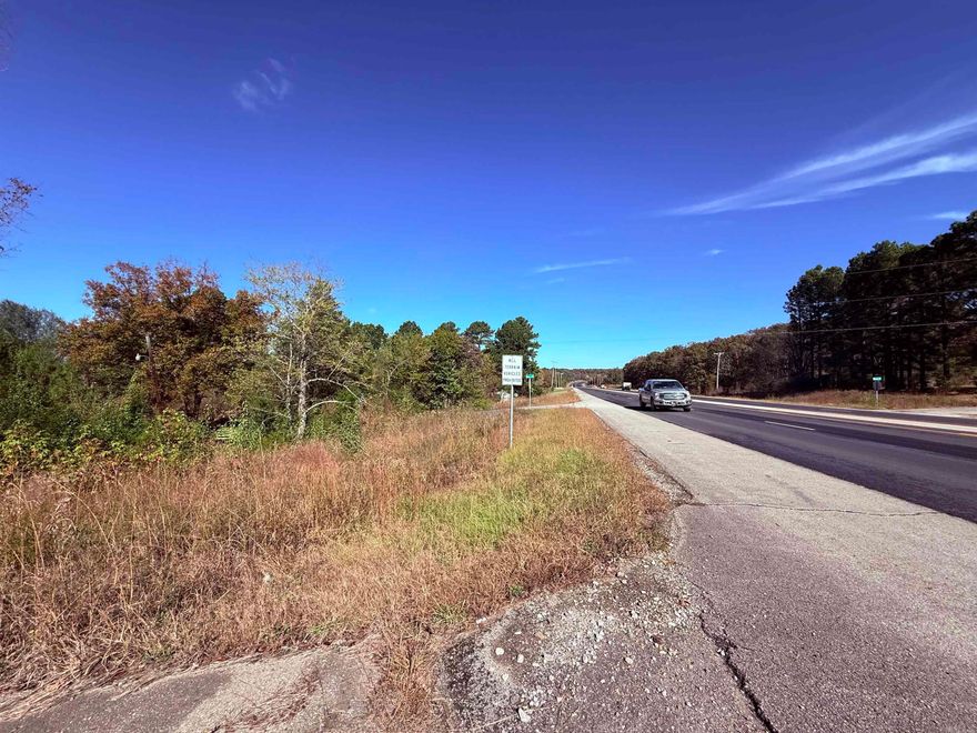 1.42-acre unrestricted parcel with direct highway frontage on one of Arkansas’s busiest routes, featuring approximately 9,100 vehicles passing daily. This high-visibility property offers exceptional potential for commercial use, investment opportunities, or personal development. The unrestricted status allows for a wide range of possibilities, including establishing a business, placing multiple mobile homes for rental income, or building a residence with room for gardening, livestock, and outdoor space.  Conveniently located minutes from both Bald Knob and Searcy, and approximately one hour from Little Rock, the site provides easy access while maintaining a flexible rural setting. Owner financing is available, offering an additional opportunity for buyers seeking versatile land with strong highway exposure in central Arkansas.