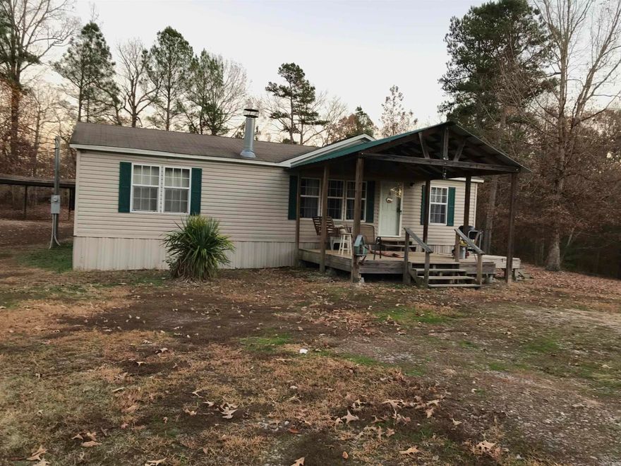 3 ACRES IN FOUNTAIN LAKE SCHOOL DISTRICT! SUPER CUTE DOUBLEWIDE ON PERMANENT FOUNDATION WITH A HUGE 30X50 SHOP! PRIVATE YET CLOSE TO MODERN CONVENIENCES!  GREAT CENTRAL LOCATION TO BENTON, HOT SPRINGS OR LITTLE ROCK!