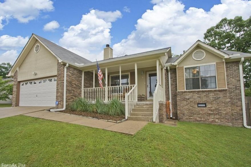 Great 1 level in Sandpiper has been completely remodeled. Refinished hardwood in the living room & kitchen/breakfast. Vaulted ceilings in the living, kitchen/breakfast & master bedroom. Kit has freshly painted cabs, new countertops, sink, faucets, dishwasher, oven & range hood. New carpet in bdrms. All new paint throughout, all new fixtures. New roof in 2011. New tile in bathrooms, master has walk in closet. Private backyard w/ 2 decks and outside storage. Extra parking on side with gate to back. Lrg garage