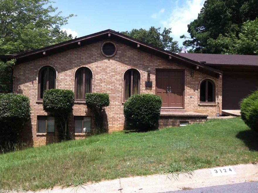 Fabulous Space Buy...3 Living areas, Living / Dining combination, Den / Family Room w/ Fireplace & Built-ins, plus Gameroom w/ Kitchenette (on lower level)  Four Bedrooms, all on lower level of this split to the rear home.  Has been rental property for years...cleaned up and ready for a buyer at this great price.  Convenient location..Walk to neighborhood Pool, Playground and Picnic area.  Needs some cosmetic updates but priced accordingly!