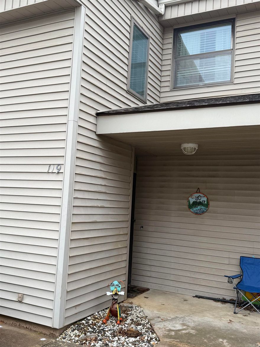 SUPER NICE LAKEWOOD CONDO!!  Beautifully remodeled kitchen, open to dining/living area, plus former patio enclosed to create a large greatroom!!  Nice  appliances, beautiful new oak cabinets (some with glass fronts), and counter tops, extra storage.  Lower level half bath is also updated, and the laundry center has been moved downstairs.  Stacked w/d included. This allowed for upstairs enlarged bath to have a new step in shower & other updates! One BR has a sleeping nook (or office space) and extra closets.   Floors are tile and wood.  Nice, soft colors, some wood wainscot on walls, and upgrade paneling in some rooms.   Energy efficient windows and doors, newer HVAC.  Fully furnished with quality furniture and decor! Even the Ping pong table!! Complex has a private Owner's Pool.  Plus convenient to shops, bank, restaurants, and FFB amenities.   You will be so impressed with this condo.  Ready to move in to, or use as a rental.  Take  a look before you miss out on this one.  Call for details about the Condo Association Dues, and also the Fairfield Bay Resort & Community Dues and service fees.  AR