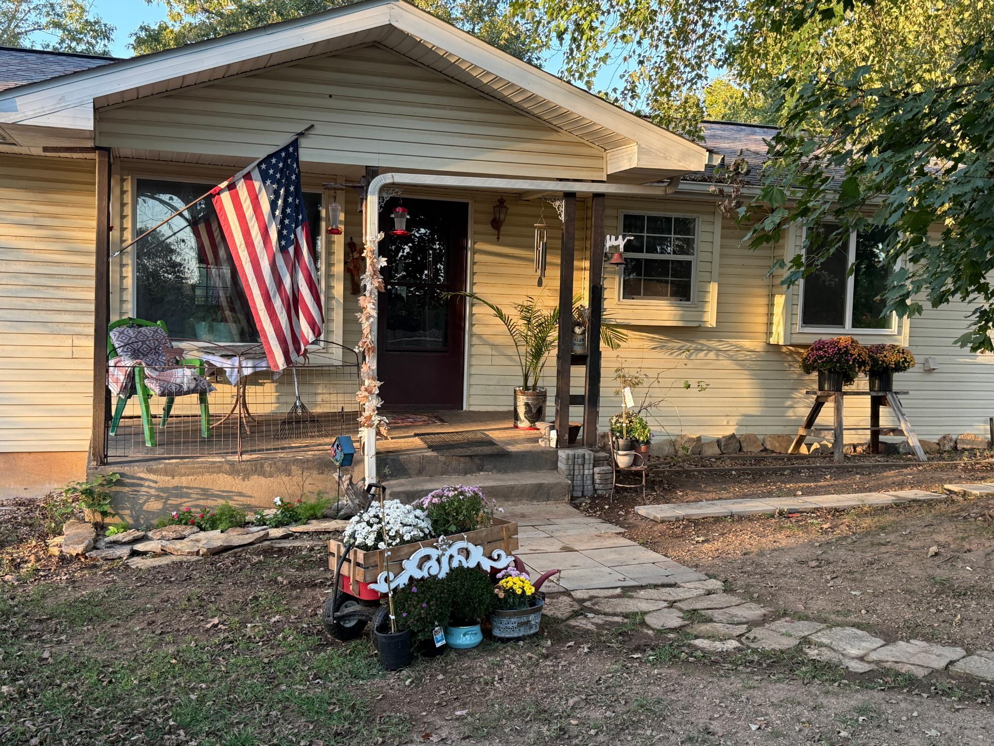 Tucked away in the scenic foothills of the Ozarks in north central Arkansas, this country home in Gepp offers the perfect blend of rural tranquility and convenience. Sitting on five wooded acres with county road frontage, the property boasts a private, natural setting with an abundance of deer and turkey. The main level of the home features 1,400 square feet with an open floor plan, three bedrooms, and two baths, plus a kitchen with ample cabinet storage and a pantry. An added bonus is the partially finished basement, which includes a fireproof gun cabinet and is already plumbed for a third bathroom. Mornings can be enjoyed on the large back deck, offering privacy and peaceful views, and the property is completed by a 24x30 two-car garage. Best of all, you're just a short drive from Mountain Home, the recreational waters of Lake Norfork, and a nearby year-round creek.