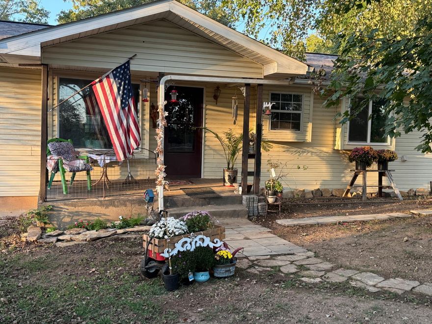 Tucked away in the scenic foothills of the Ozarks in north central Arkansas, this country home in Gepp offers the perfect blend of rural tranquility and convenience. Sitting on five wooded acres with county road frontage, the property boasts a private, natural setting with an abundance of deer and turkey. The main level of the home features 1,400 square feet with an open floor plan, three bedrooms, and two baths, plus a kitchen with ample cabinet storage and a pantry. An added bonus is the partially finished basement, which includes a fireproof gun cabinet and is already plumbed for a third bathroom. Mornings can be enjoyed on the large back deck, offering privacy and peaceful views, and the property is completed by a 24x30 two-car garage. Best of all, you're just a short drive from Mountain Home, the recreational waters of Lake Norfork, and a nearby year-round creek.