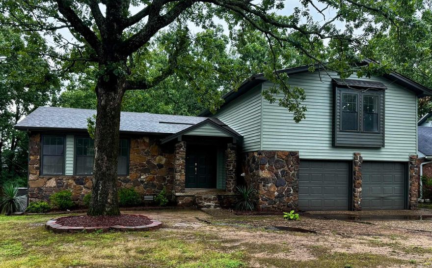 Beautiful 4-bedroom, 2-bathroom home offering the perfect blend of convenience and privacy. Enjoy the comfort of being close to town while surrounded by the peaceful seclusion of a wooded backyard. Features include a spacious back deck ideal for entertaining, two inviting living areas, a cozy wood-burning fireplace, and a fully updated kitchen with brand-new appliances.